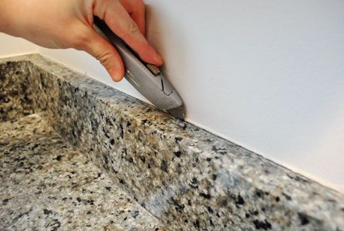 Removing The Side Splash Amp Backsplash From Our Bathroom How To Remove Countertop And Backsplash 